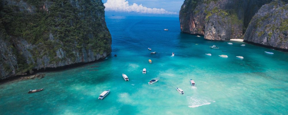 iso-republic-boats-sail-on-clear-blue-water